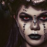 Spooky woman with makeup of spells