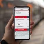 person holding silver iphone 6