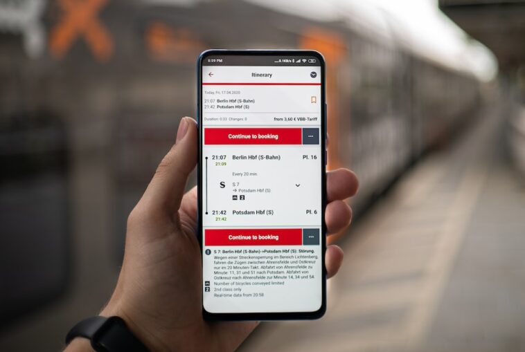 person holding silver iphone 6