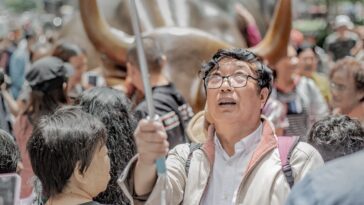 shallow focus photo of man in white jacket