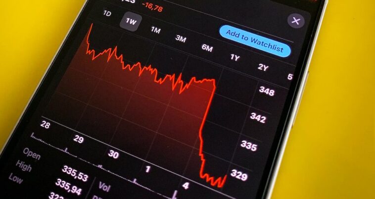 a cell phone with a chart on the screen