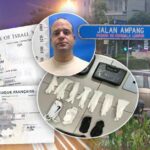 מעצר שלום אביטן במלזיה בצירוף דרכונים ואמצעי לחימה שנמצאו ברשותו. תצלומי מעצר באדיבות משטרת מלזיה. רקע ג'אלאן אמפנג בו בוצע המעצר: Azreey