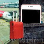 עיבוד תצלומים מזוודה, טלפון ניד בכיס יחד עם שטר כסף. ברקע מטוס בשדה התעופה סוואנאפום סמוך לבנגקוק בתאילנד